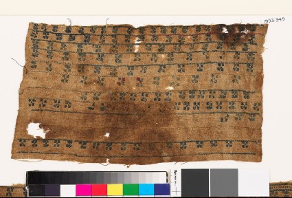 Textile fragment with bands of diagonal crossesfront