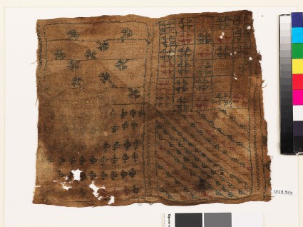 Sampler with diagonal lines, triangles, floral shapes, and squaresfront