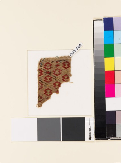 Textile fragment with double and single diamond-shapesfront