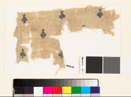 Textile fragment with diamond-shaped medallions and palmettesfront