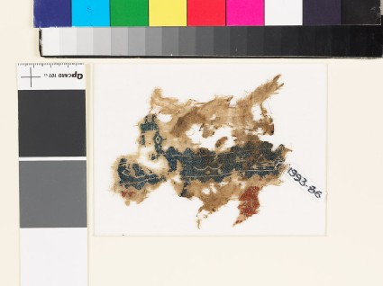 Textile fragment with pseudo kufic inscription and birdsfront