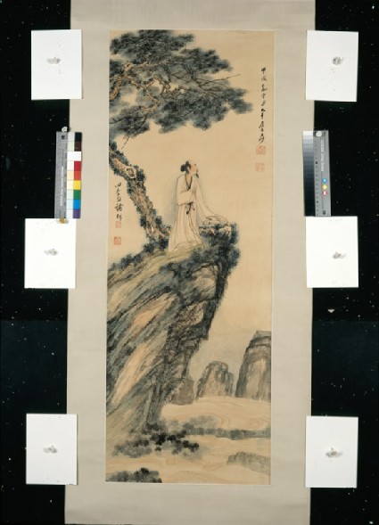 Scholar by a treefront