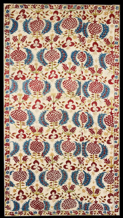 Wall hanging with tulips, pomegranates, and serrated leavesfront