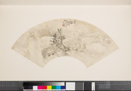 Building underneath a tree in a mountainous landscapefront