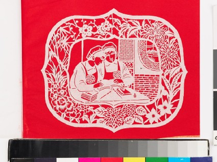 Two female workers studyingfront