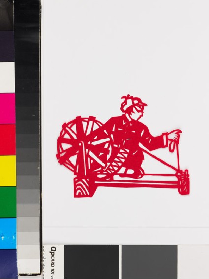 Figure with spinning wheelfront