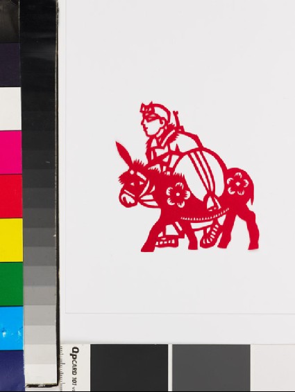 Figure with donkey carrying grainfront