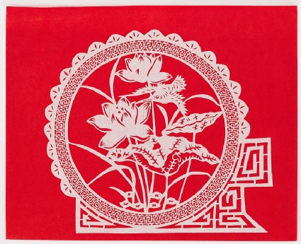 Kingfisher among lotus plantsfront