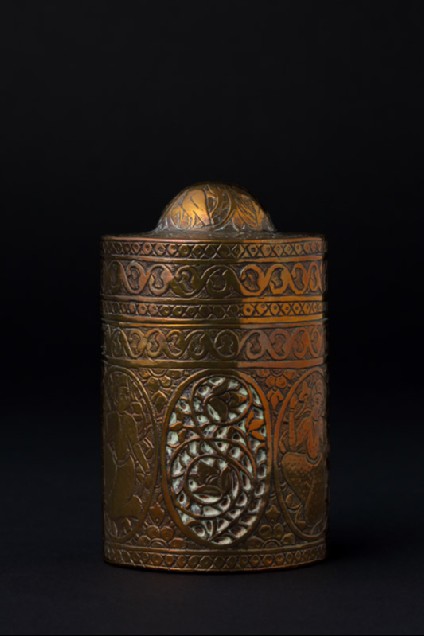 Inkwell with figures and leavesfront