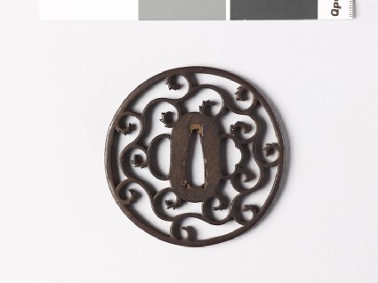 Round tsuba with karakusa, or scroll plant patternfront