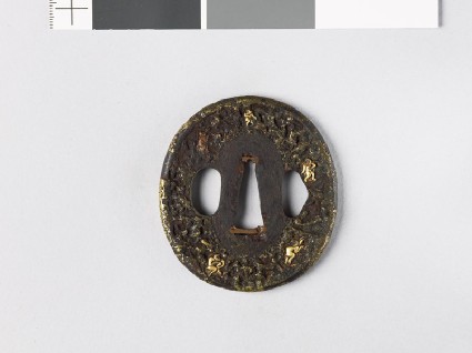 Tsuba with 'stick-lac' decoration and monkeys amid rocksfront