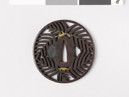Tsuba with warabi, or bracken frondsfront