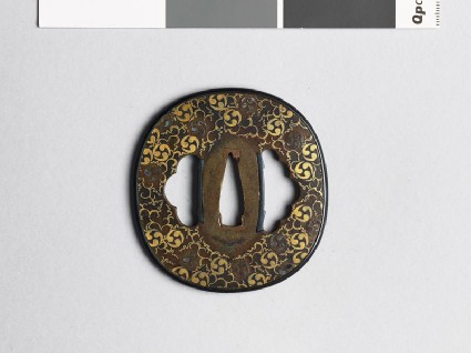 Tsuba with mitsudomoye, or three-comma shapesfront