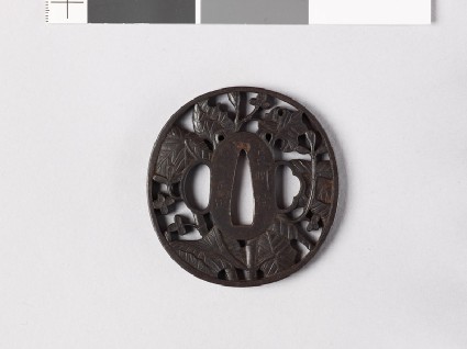 Tsuba with begonia plantfront