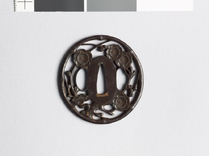 Tsuba with flowering plum treefront