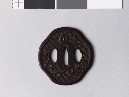 Mokkō-shaped tsuba with amariō, or rain dragonsfront