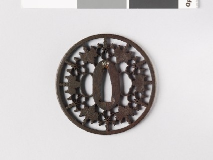 Round tsuba with gosan-no-kiri, or paulownia leavesfront