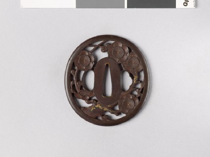 Tsuba with flowering plum treefront