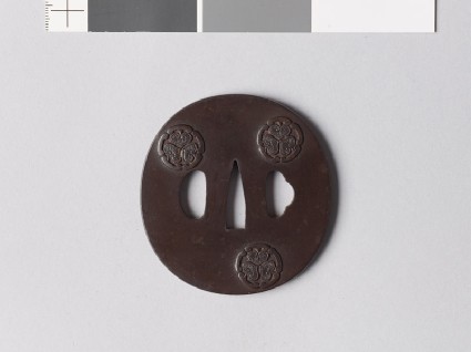 Tsuba with kwan-wa ni mitsu-aoi mon, comprising hollyhock leaves inside drawer handlesfront