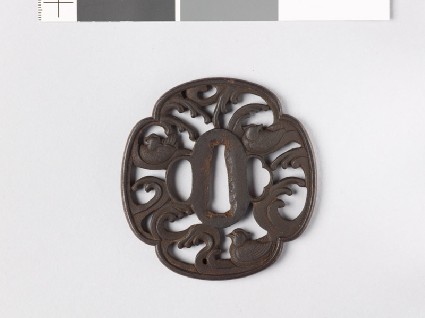 Mokkō-shaped tsuba with mandarin ducks and wavesfront