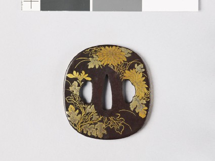 Tsuba with chrysanthemumsfront