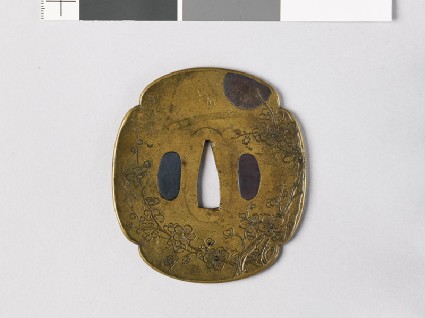 Mokkō-shaped tsuba with flowering plum treefront