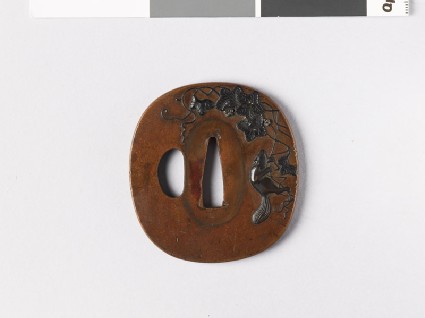 Tsuba with squirrel climbing up a grape vinefront