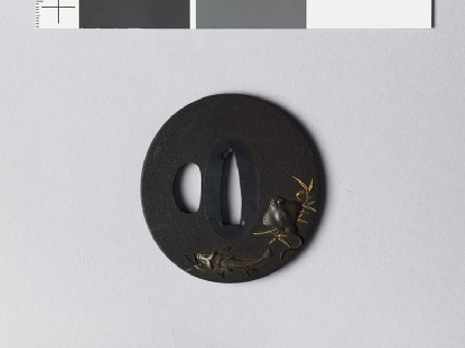 Tsuba with ray, ling, and plaicefront