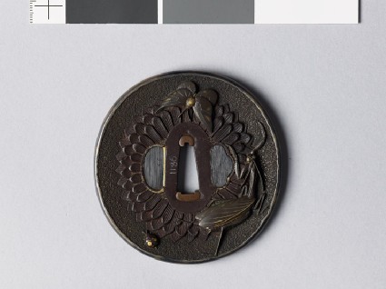 Tsuba with chrysanthemum flower and animalsfront