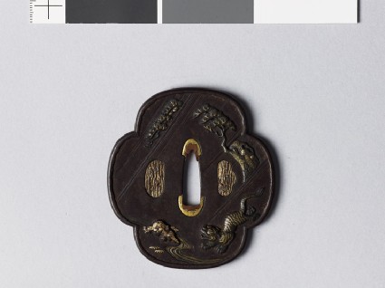 Mokkō-shaped tsuba depicting a tiger running by a streamfront