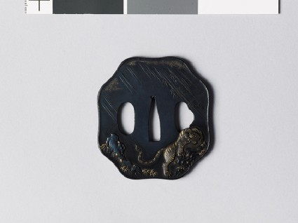 Octagonal tsuba with tiger in a stormy landscapefront