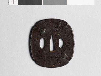 Mokkō-shaped tsuba with flying wild geesefront
