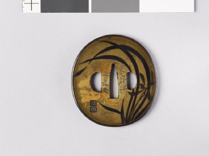 Tsuba with orchis plantsfront