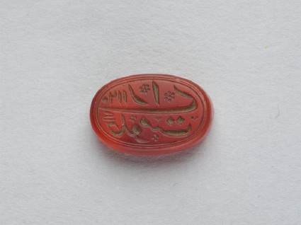 Oval bezel seal with nasta‘liq inscription and floral decorationfront