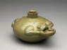 Greenware water pot in the form of a frog (oblique)