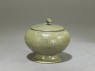 Globular greenware jar with lotus flower decoration (oblique)