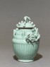 Greenware funerary jar with dragon (side)
