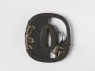 Tsuba depicting Shōki pursuing a demon (back)