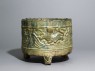 Three-legged basin, or lian, with tigers and mountains in relief (side)