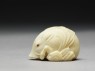 Netsuke in the form of a wild boar among grass (side)