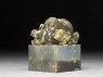 Jade seal surmounted by lion-dog with four pups and ball (side)