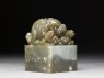 Jade seal surmounted by lion-dog with four pups and ball (side)