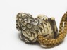 Netsuke in the form of a shishi, or lion dog (oblique)