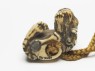 Netsuke in the form of a shishi, or lion dog (bottom)