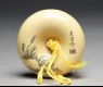 Manjū netsuke depicting Tamamo no Mae, with Nasu Moor on the reverse (back)