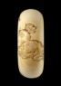 Manjū netsuke depicting a boy chasing away two oni, or demons (side)