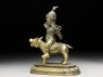 Figure of Las Mkhan damar po, acolyte of Beg-tse god of war, on a wolf (side)