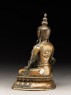 Figure of Amitayus meditating on a lotus-petalled throne (side)