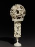Ivory ball and stand with floral decoration (side)