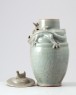 Greenware funerary jar and lid with dragon, bird, and a dog (oblique)